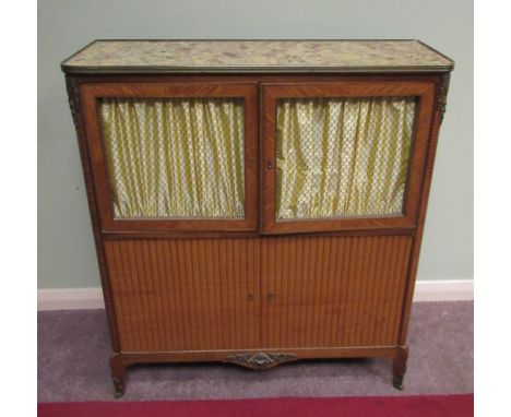 Late C19th French ormolu mounted kingwood side cabinet with inset marble top above a pair of brass grilled silk panel doors, 