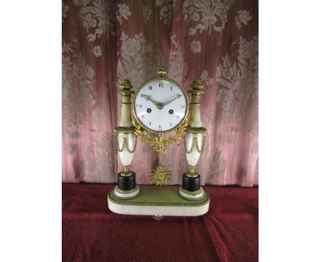 C19th French ormolu mounted alabaster mantel clock, drum movement with convex Arabic dial on column supports, twin train move