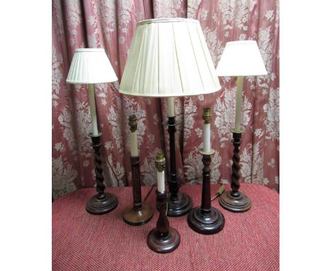 Pair of oak barley twist column candlestick table lamps H56cm, a similar lamp with plain turned column H56cm, and three simil