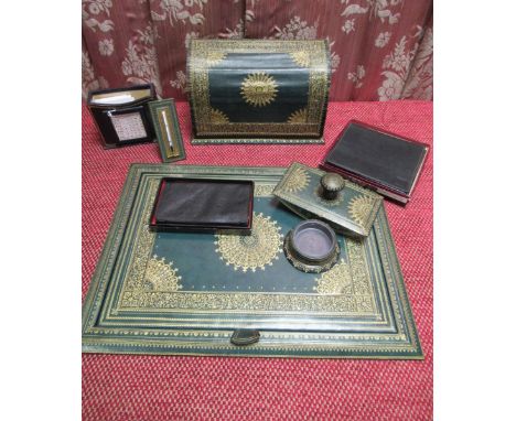 Early C20th gilt tooled green leather desk set comprising rectangular writing pad with reversible blotter W33cm D46cm, a thre