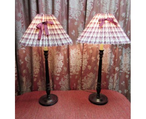 Pair of Geo. III style mahogany candlestick table lamps, with urn sconces and fluted columns, on reeded circular base, with g