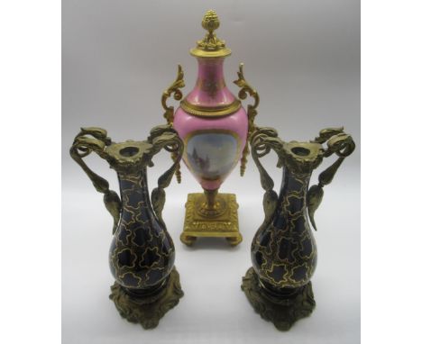 C20th Sevres style gilt metal mounted pink ground porcelain vase decorated with a figure of a lady and a castle landscape, on