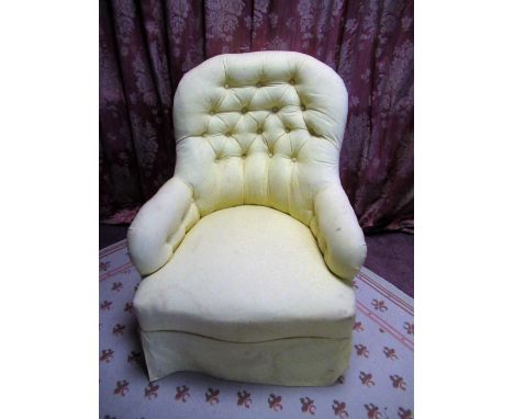 Victorian upholstered nursing chair, arched button back and scroll arms on parcel gilt turned tapering supports with brass so