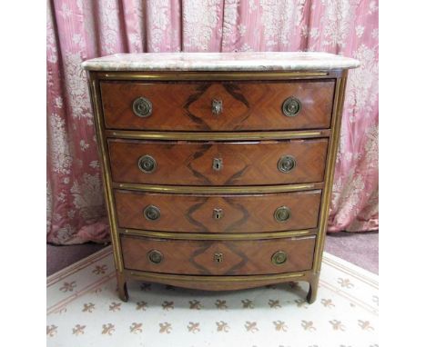 Late C19th French parcel gilt kingwood bow front commode, with variegated marble top above four long graduated drawers with b