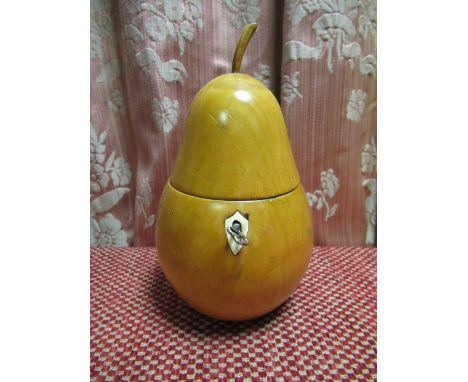 Treen tea caddy in the form of a pear, hinged cover with stalk finial, bone escutcheon, H20cm 