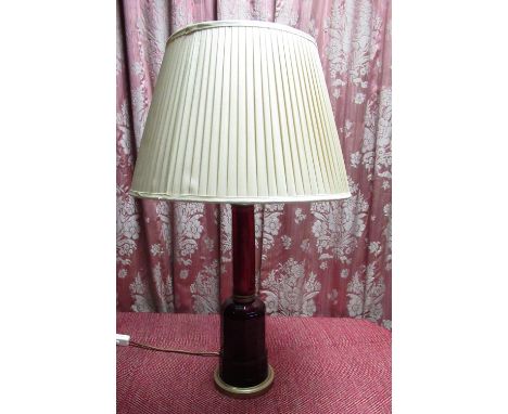 Victorian style red table lamp of stepped faceted form, on circular stepped brass base, with shade, H53cm 