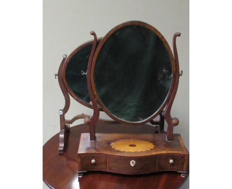 George III satinwood crossbanded mahogany toilet mirror, upright oval plate on square curved supports, serpentine base inlaid
