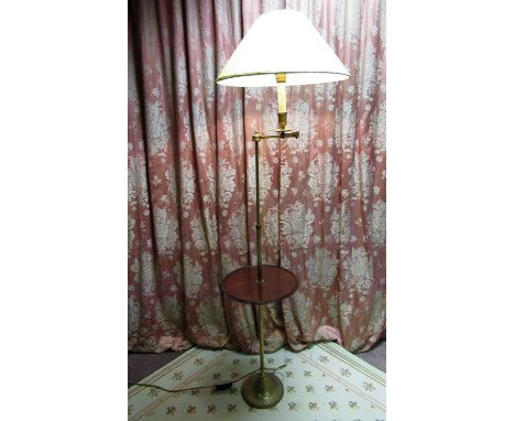 Regency style brass floor lamp with table, adjustable column with articulated arm on circular base, with white tapering shade