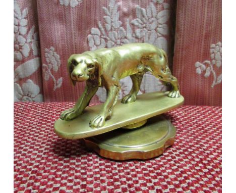 Cast brass radiator cap model of a hunting dog 