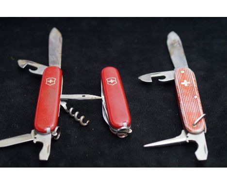 3 Swiss army knives 