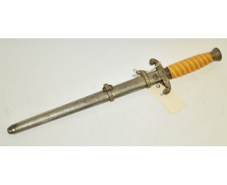 Second World War German Army Officer's dagger, with orange celluloid grip and 'hammered' scabbard, 40cms long.