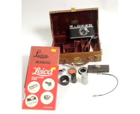 A Leica II rangefinder camera, serial no. 297067, made in 1938; an Elmar 50mm f3.5 lens; a 50mm bright line viewfinder; a 'sp