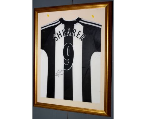 A Newcastle United facsimile football shirt, No. 9, signed by Alan Shearer, in glazed gilt frame.