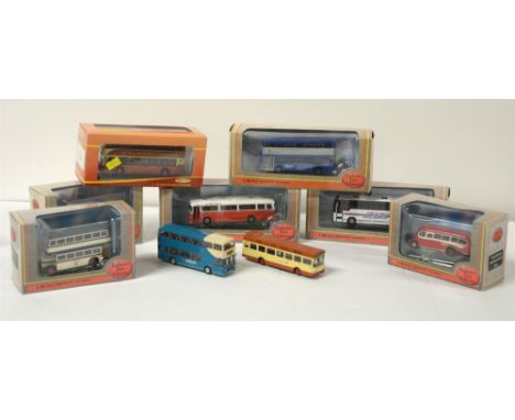Die-cast model buses by Exclusive First Editions and CMN Ltd., in bubble-packs. (9)