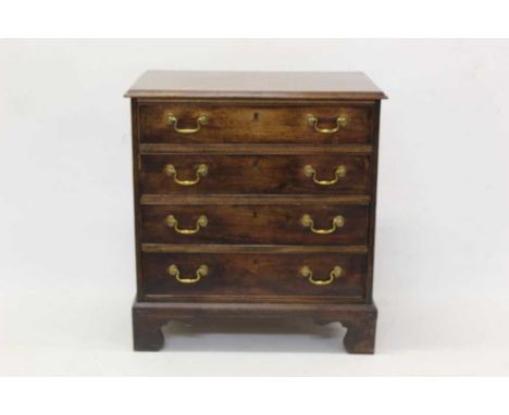 George III mahogany chest of four drawers, raised on bracket feet, converted from a commode, 68cm wide x 48cm deep x 72cm hig