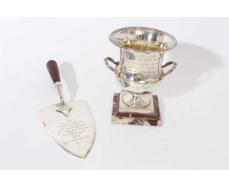 Edwardian silver vase of campana form, with engraved presentation inscription, twin vine handles and reed and ribbon border, 