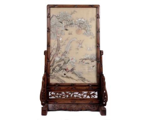 Early 20th century Chinese table screen, with silk banner embroidered with birds in a landscape, glazed faux bamboo carved ha