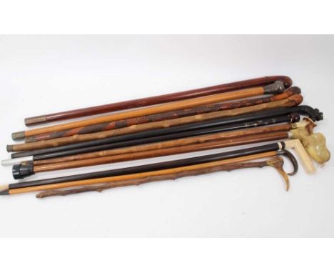 Group group of antique walking sticks including ivory handled ebony stick, late 19th / early 20th century Japanese bamboo sti