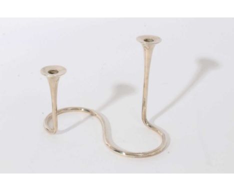 Danish modernistic candlestick, with twin trumpet shaped candle holders, on a "S" curve base stamped Sterling Denmark, by Mic