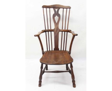 Good rare 18th century yew wood and elm comb back elbow chair, with pierced vase splat and solid saddle seat on turned splaye