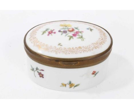 19th Century Dresden porcelain snuff box, oval form painted with floral sprays and gilt borders, the domed hinged cover paint