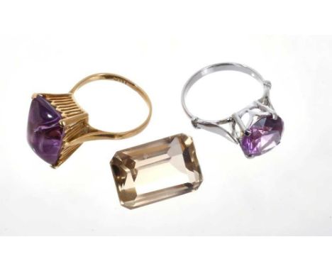 A sugarloaf amethyst cabochon single stone ring in 18ct gold setting, a faux Alexanderite dress ring in eastern white gold se