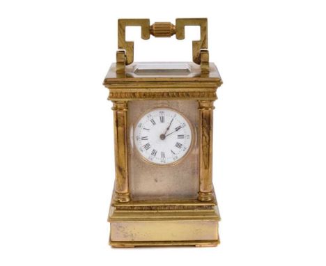Late Victorian miniature carriage clock in classical -style gilt brass case 10.5cm with key in travelling case.