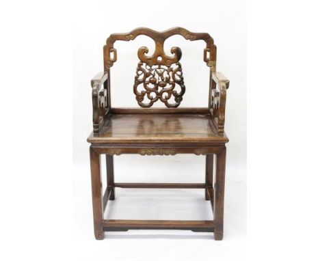 Good antique Chinese hardwood elbow chair, the shaped back with pierced and carved peach and scroll ornament, solid seat on c