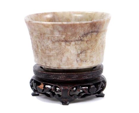 Chinese Archaic style mutton jade vessel, flared oval form, geometric scroll band, raised on hollow foot, 7cm wide, raised on