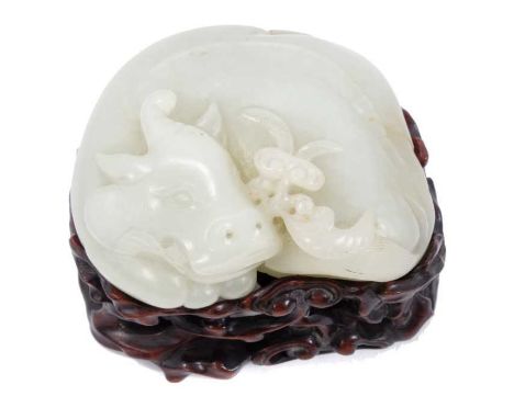 Fine Chinese Qing pale celedon jade pebble carving, in the form of a water buffalo, 8cm wide, raised on fine carved and pierc