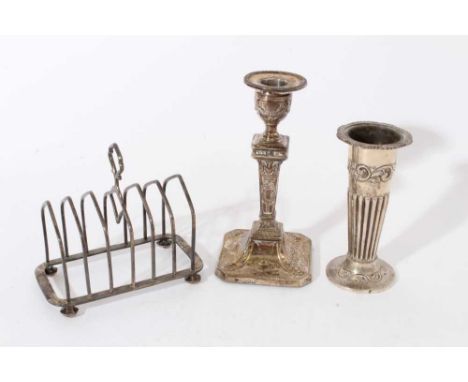 Three items of miscellaneous Edwardian silver including a candlestick of neoclassical form (London 1903) a spill vase of half