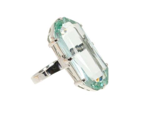 Art Deco style ladies' aquamarine cocktail ring with a large elongated octagonal mixed cut aquamarine measuring approximately