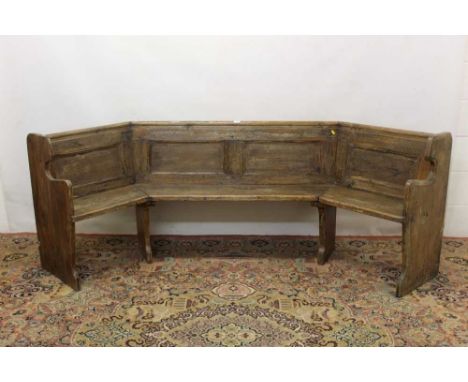 Unusual Victorian pine pew, bowed panelled form on shaped ends, bible shelf to rear, traces of paint, approximately 240cm wid