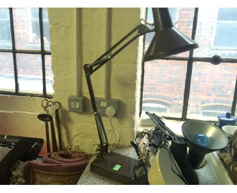 An angle poise desk lamp together with three similar lamps