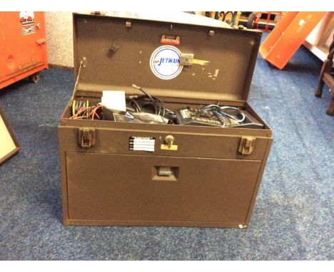 A portable tool cabinet with engineers tools