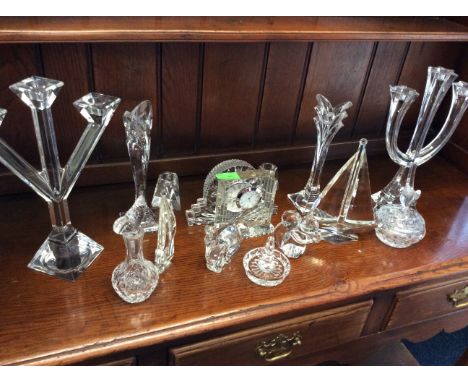 A collection of various glass to include Galway ships and mantle clock, Harrods butterfly vase and pot with lid, glass candle