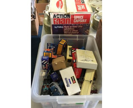 A carton of assorted diecasts including Corgi, Burago etc together with a boxed Action Man space capsule.