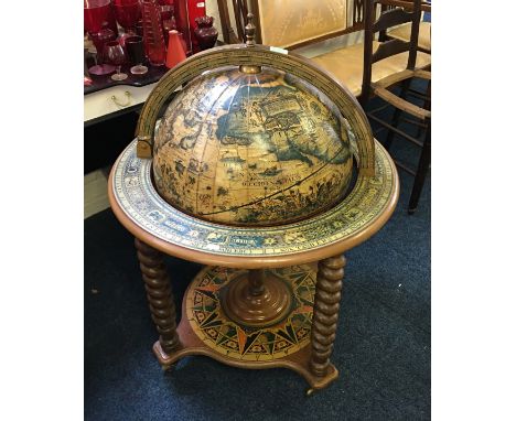 A reproduction globe cocktail drinks cabinet.