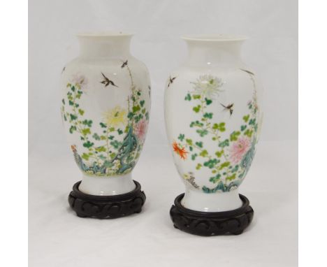Pair of Chinese famille rose porcelain oviform geese vases, bearing Hongxian marks, probably Republic period, with raised pol