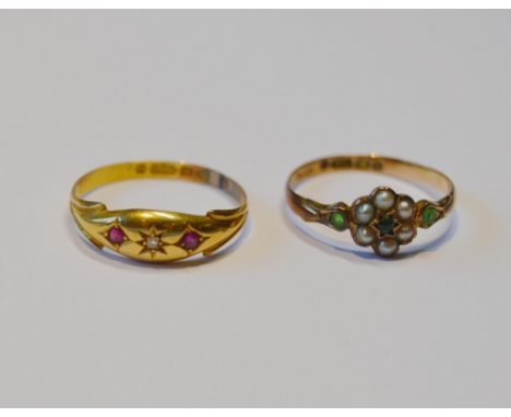 Late Victorian 15ct gold lady's ruby and diamond ring set with very small star-cut brilliant flanked by small rubies in a loz