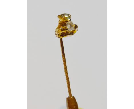 Victorian gold scarf pin modelled as a bear gripping an old-cut diamond, probably 15ct, 5.2g gross.CONDITION REPORT: Good con
