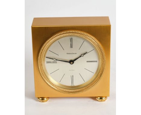 Tischuhr, "Electric", Jaeger LeCoultre, 20. Jh., Messing, vergoldet, flaches, quadratisches Uhrengehäuse auf gedrückten Füßen