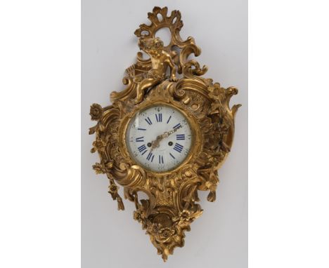 Cartel-Uhr, Bronze, vergoldet, Friedrich Böhler, Frankfurt/M., um 1850, Gehäuse mit Rocaillen, Blüten und bekrönendem Putto, 