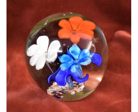 Vintage Glass paperweight in a red satin box with bead embellishment. The Paperweight in a floral design. A nice item
