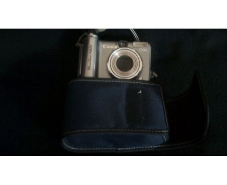 Camera - Cannon Power Shot A620, 7.1 mega Pixels with leads and case.