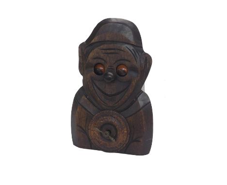 Novelty automaton clock timepiece in the form of a clown with moving eyes, 8" high