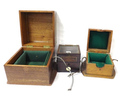 Early mahogany marine chronometer case with glazed top and two brass carrying handles; also two marine chronometer guard case