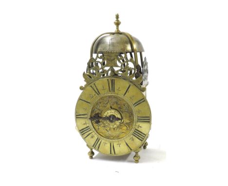 Small interesting French brass verge hook and spike lantern clock with alarm, the 5" brass dial enclosing a foliate engraved 