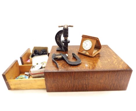 Oak two drawer chest containing sundry watch parts including pocket watch movements, winding buttons etc, 13" wide; together 