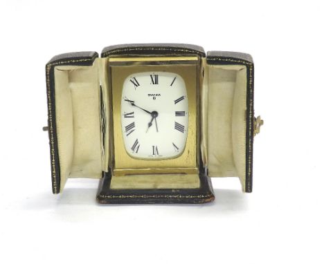 Contemporary Swiza eight day alarm clock timepiece, the large dial within a brushed brass carriage type case, 3.5" high, with